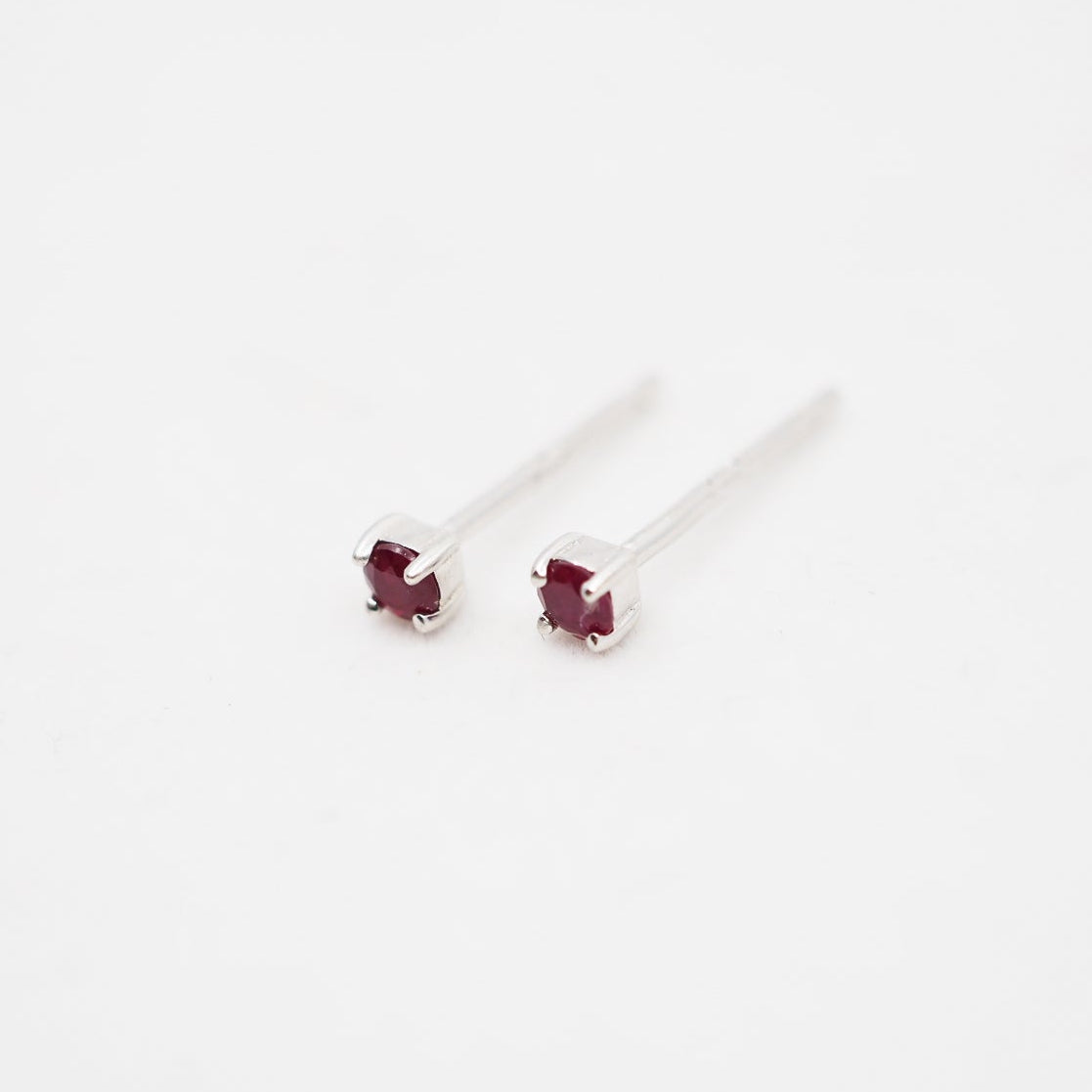 Sterling Silver Ruby Claw Studs
