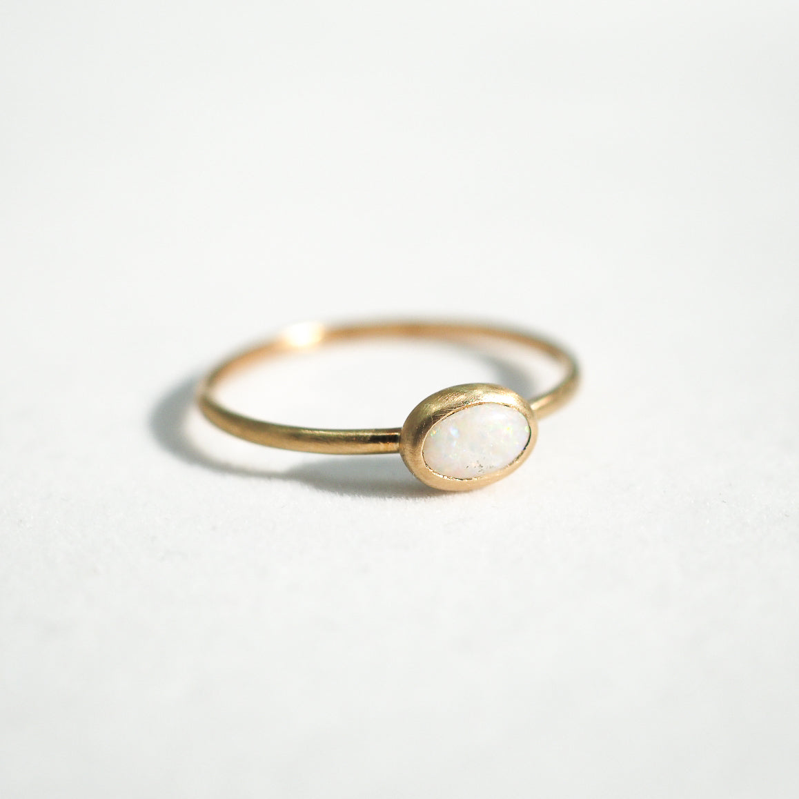 10k Gold White Opal Oval Stacking Ring