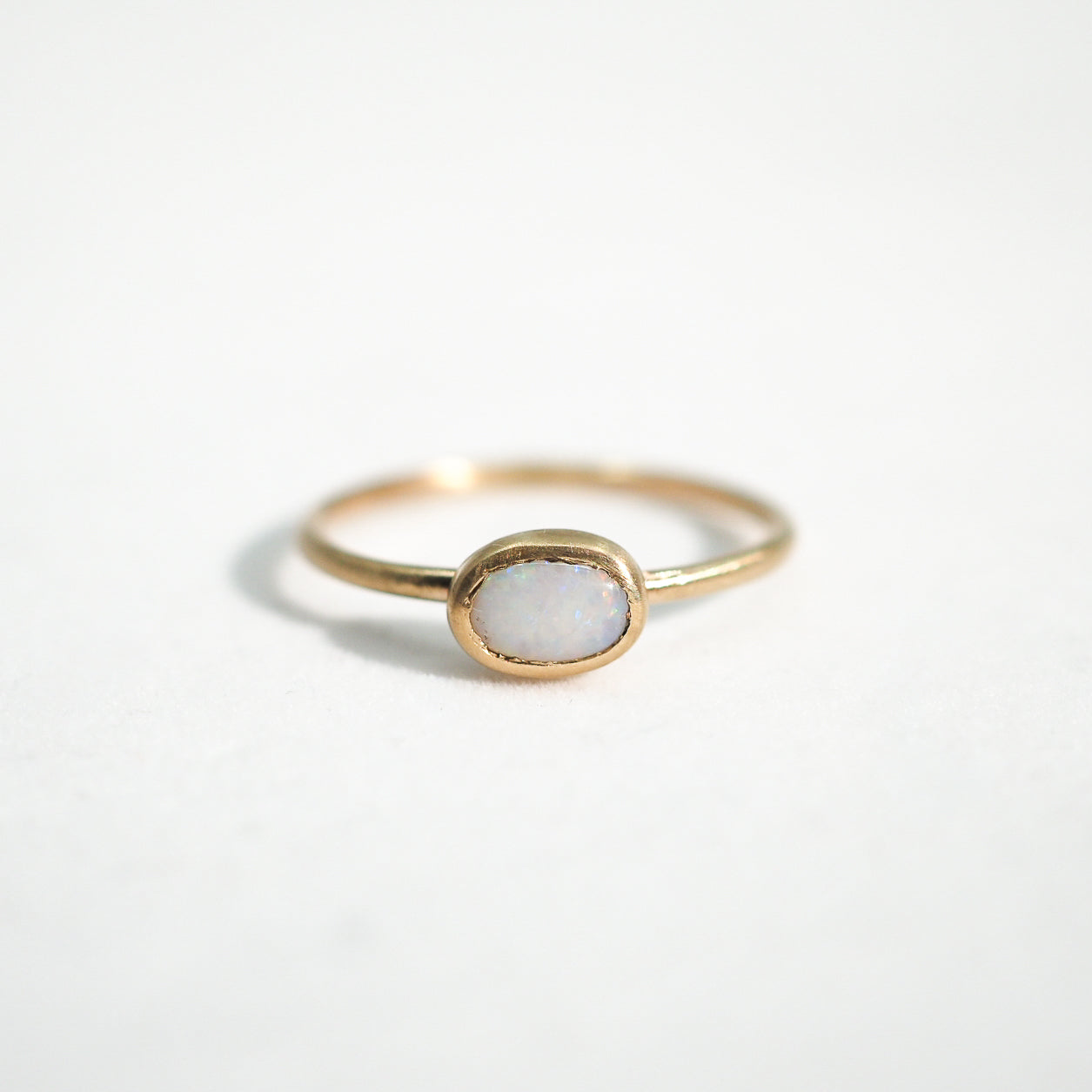 10k Gold White Opal Oval Stacking Ring