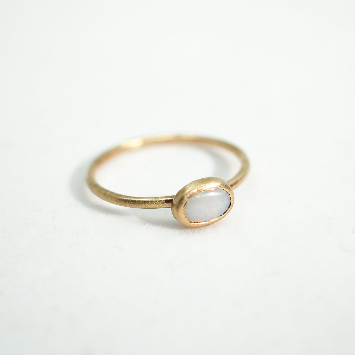 10k Gold White Opal Oval Stacking Ring